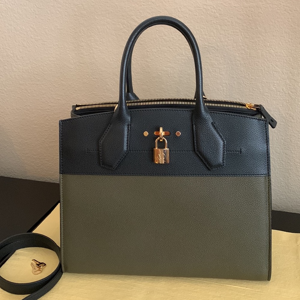 LOUIS VUITTON City Steamer MM in olive/black grained calfskin. LV key twist lock